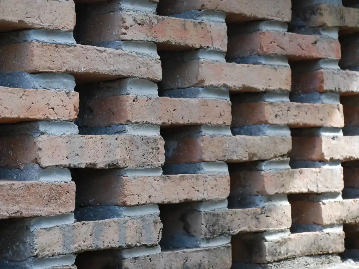 Stacked bricks in a wall pattern. masonry
